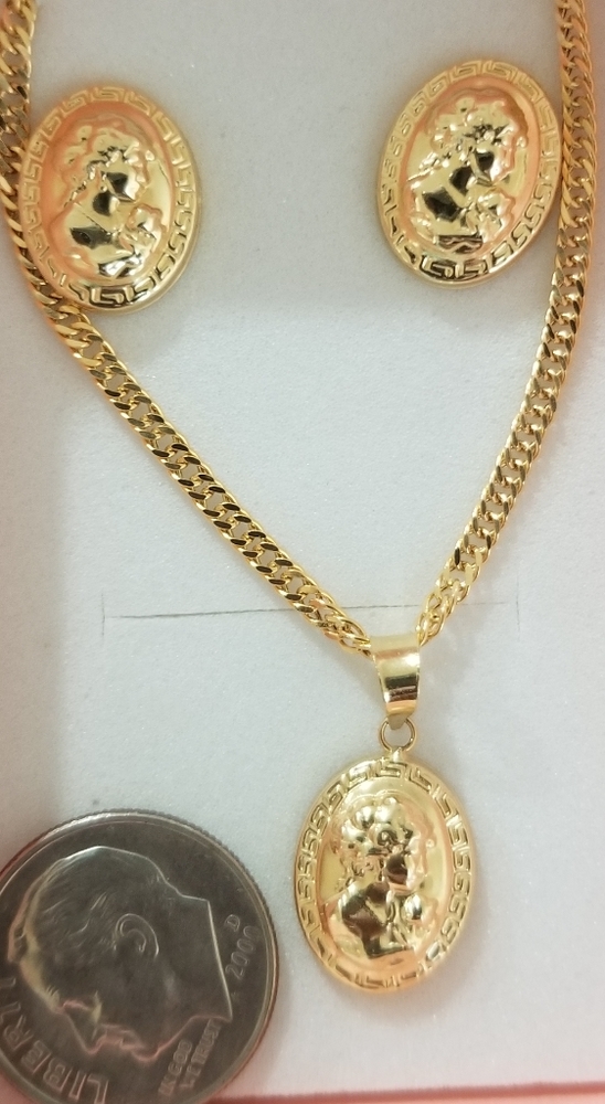 18 Karat Gold queen Elizabeth set